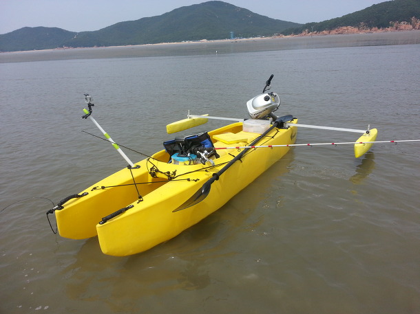 my fishing kayak rigged with a 2 hp outboard engine ...