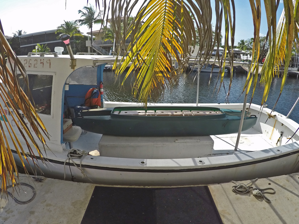 Wavewalk 700 with an outboard gas motor, and with an electric