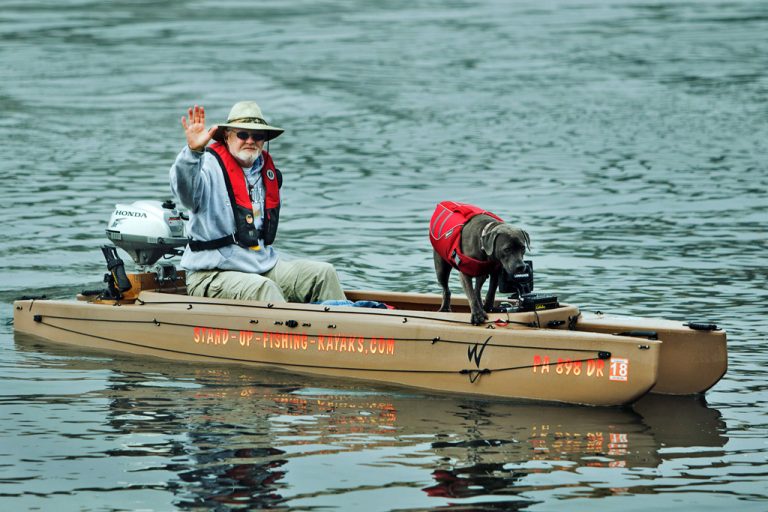 Wavewalk 700 with an outboard gas motor, and with an electric trolling ...