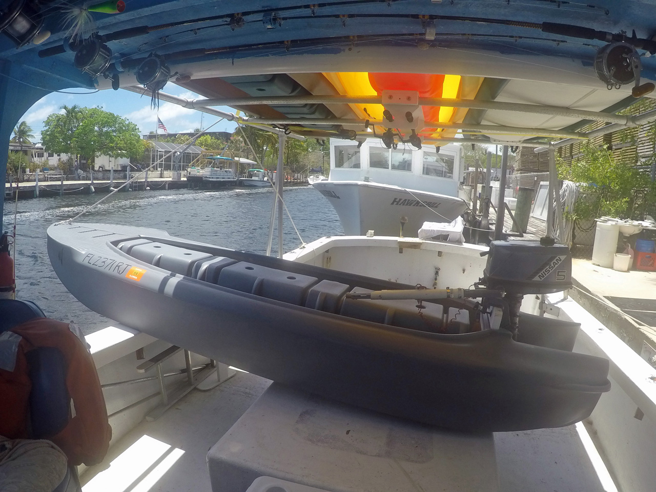 Wavewalk 700 with an outboard gas motor, and with an electric