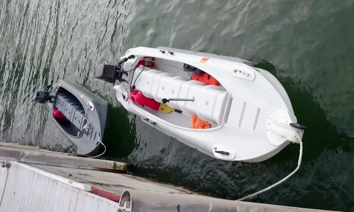 Two S4 microskiffs powered by different size motors