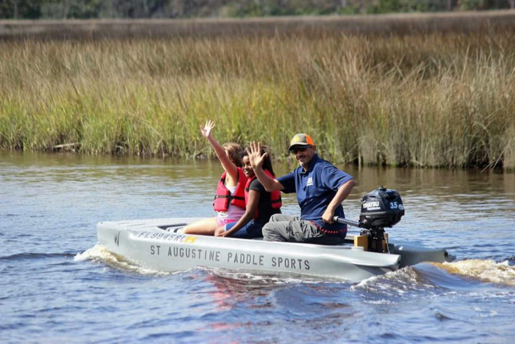 Wavewalk S4 kayak skiff powered by a 3.5 HP Tohatsu outboard motor