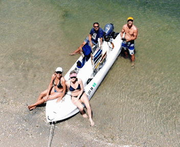 4 passengers in motorized S4 kayak skiff