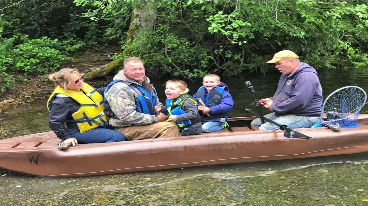 Adults and kids on board a Wavewalk S4 kayak