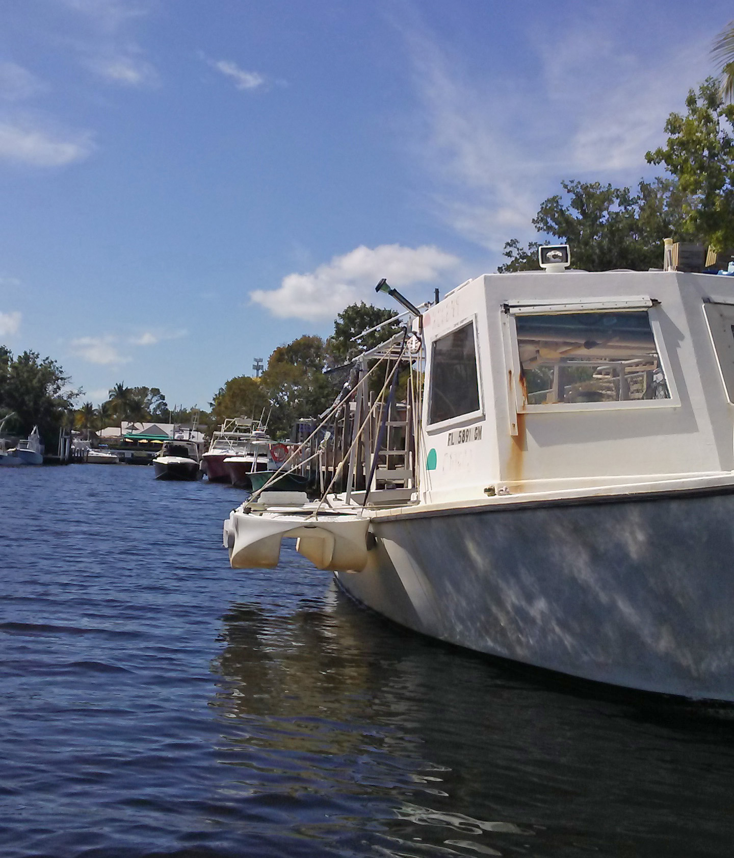 S4 boat tender attached on the side of a fishing boat