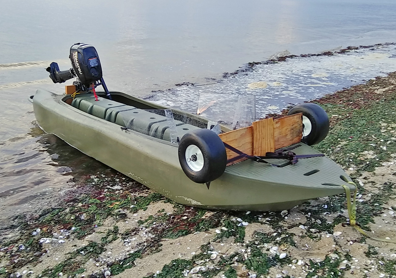 S4 micro skiff beached on the sand