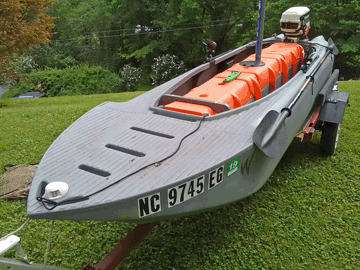 motorized Wavewalk S4 fishing kayak skiff with 6 HP Johnson