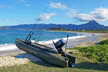 motorized kayak rigged for offshore fishing - Hawaii beach Wavewalk S4