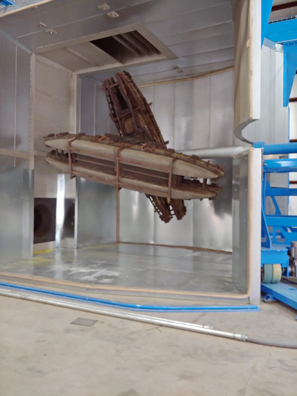 Two rotational molds of Wavewalk kayak on one machine