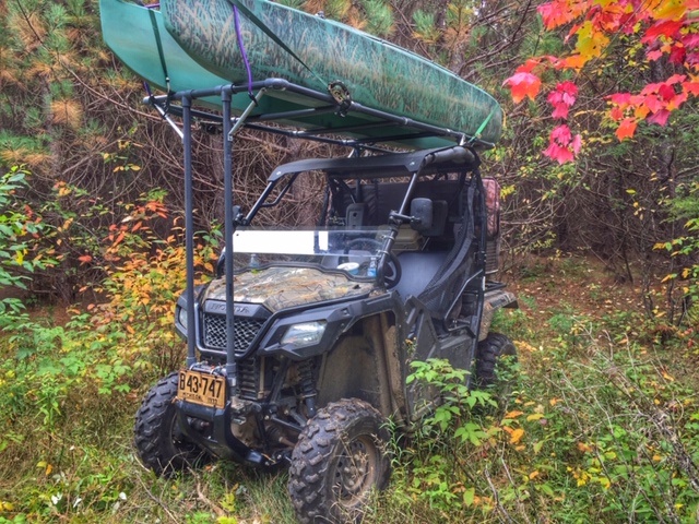 Rack for transporting kayak on ATV