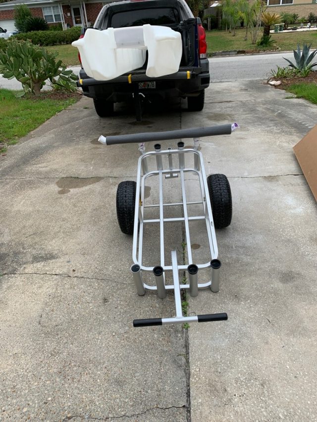 S4 kayak skiff on pickup truck bed and wheel cart for carrying STABLE