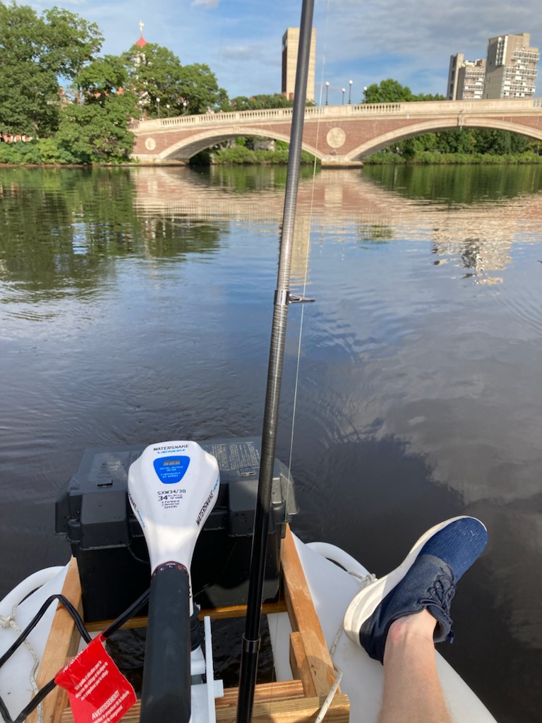 Fishing in the Charles near Week's footbridge Harvard.
