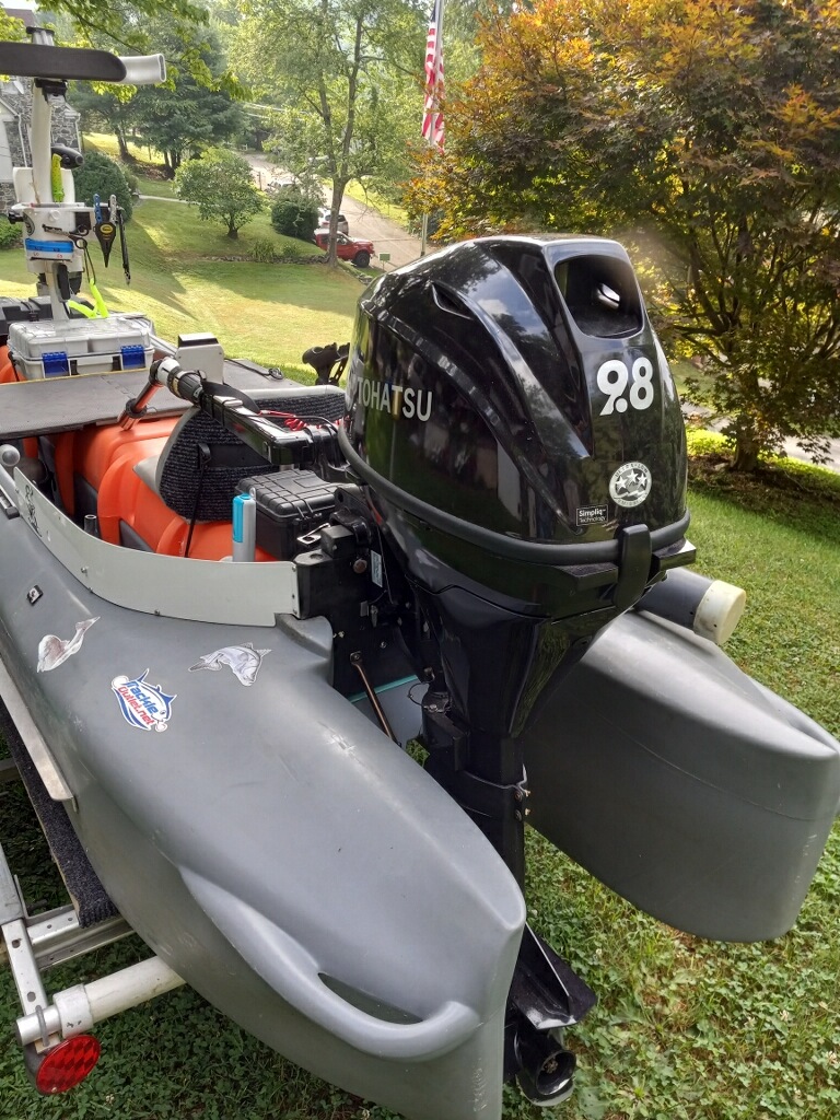 9.8 HP Tohatsu outboard motor on S4 microskiff