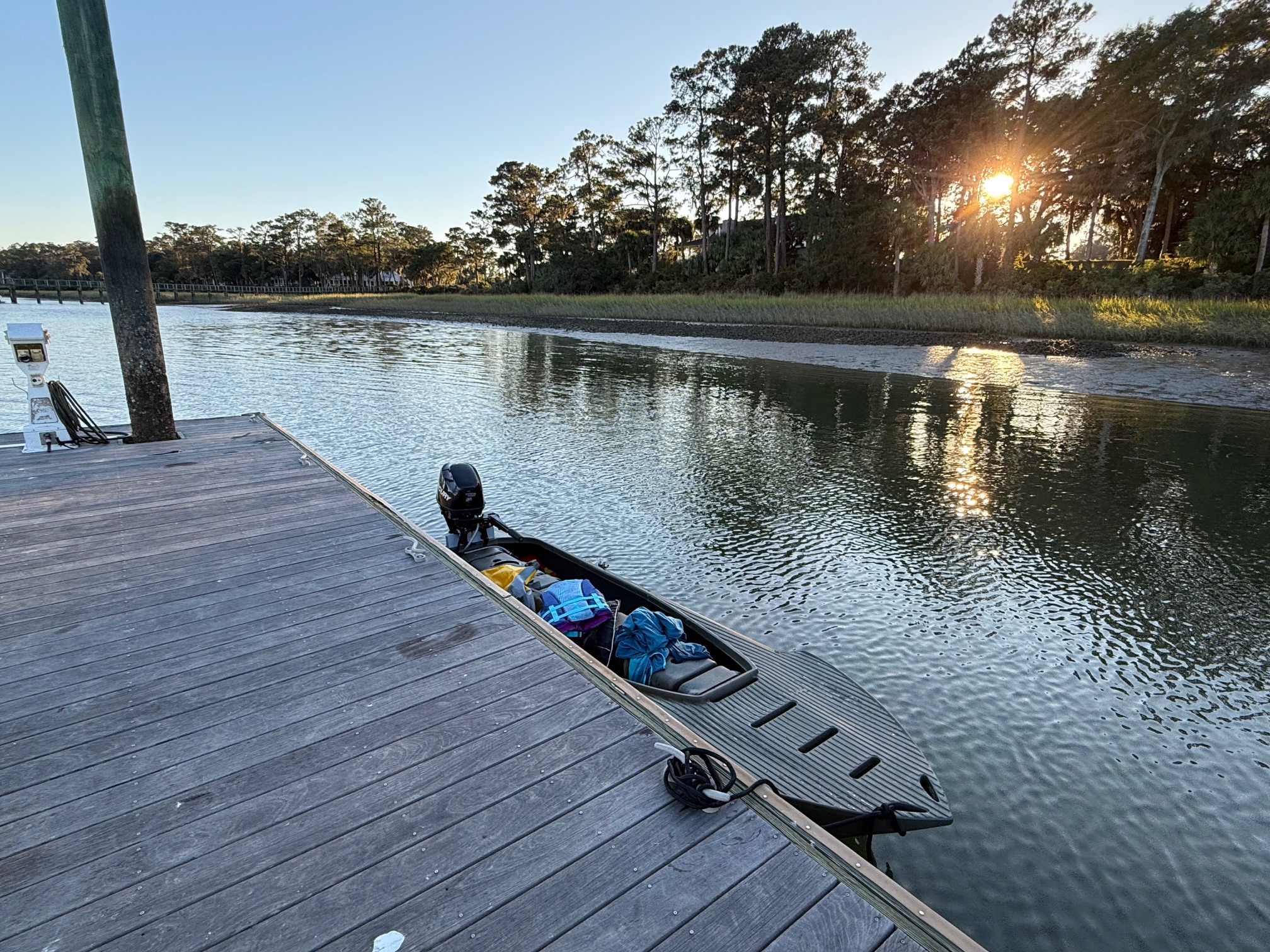 S4 microskiff with 10 hp outboard docked